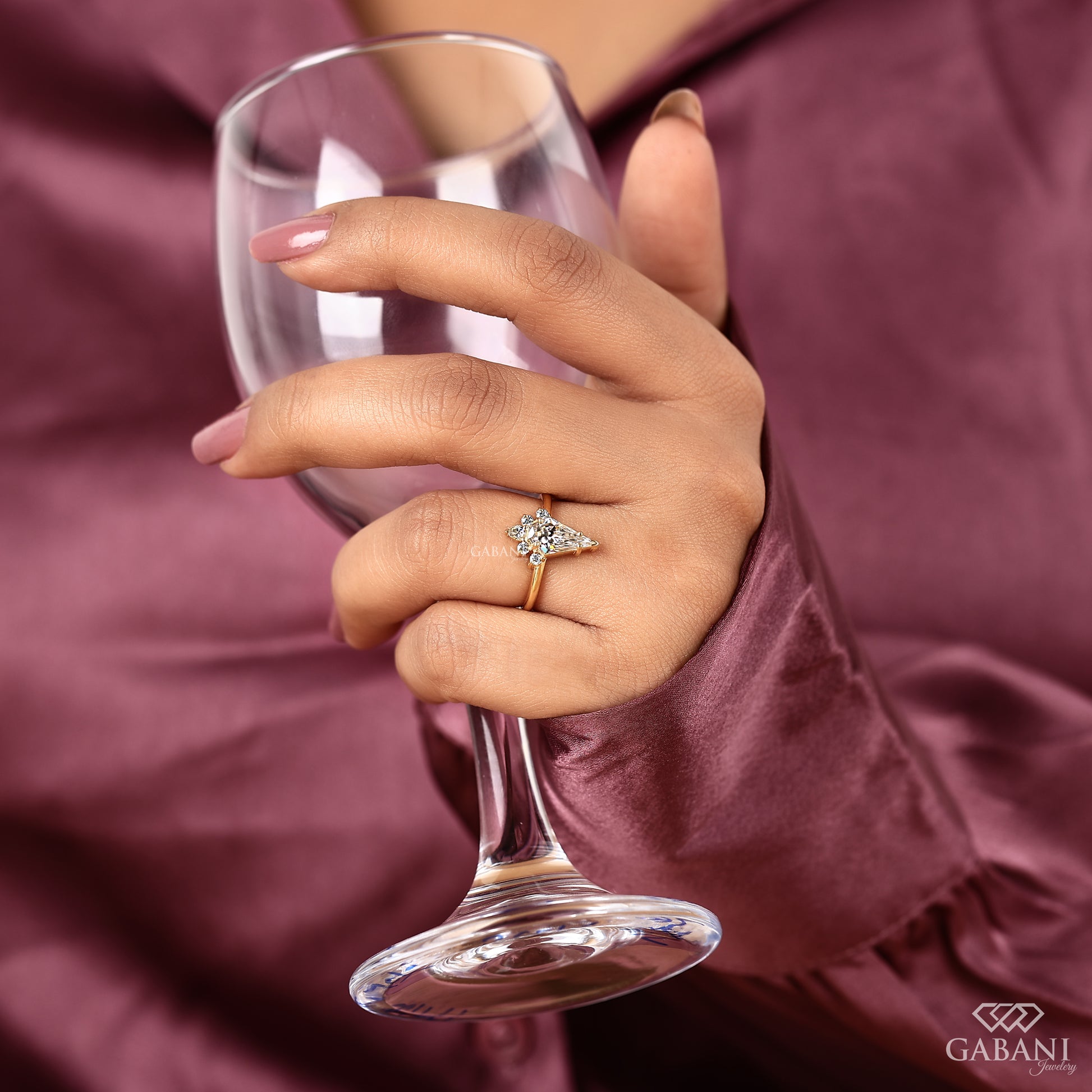 yellow gold vintage ring with kite cut lab grown diamond and round pear diamonds