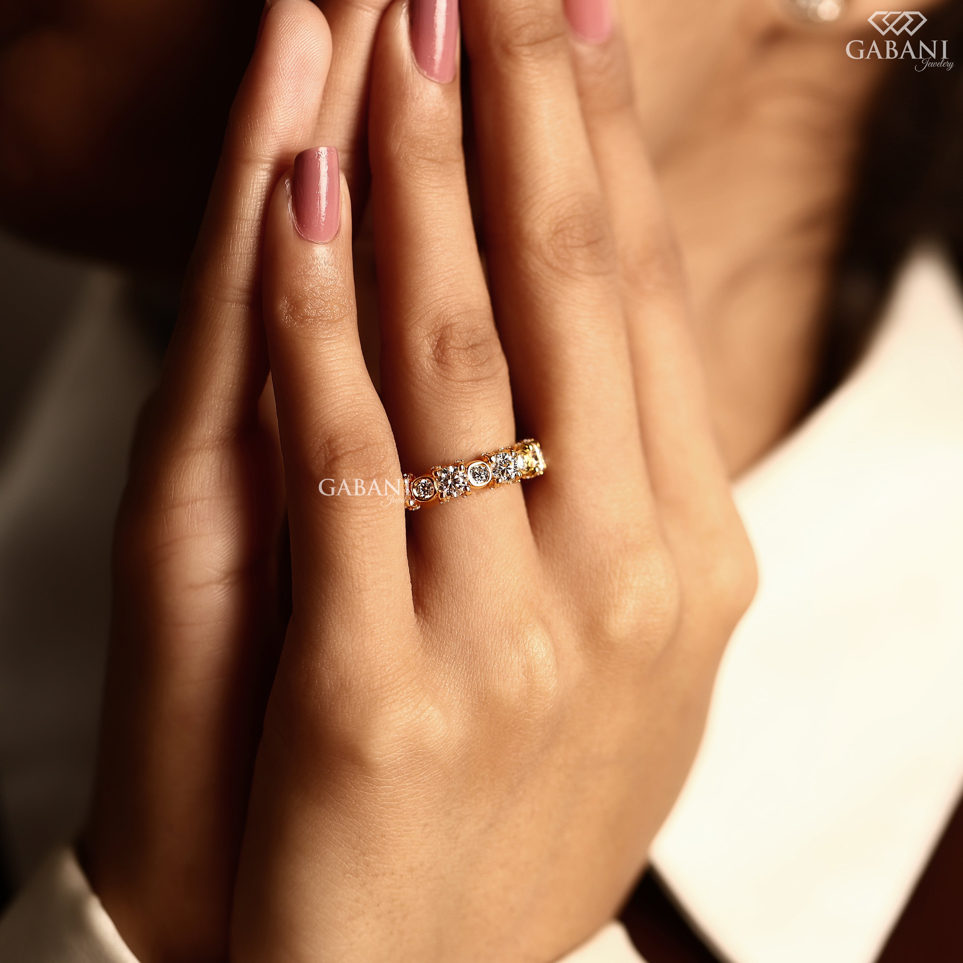 Full eternity diamond band featuring round cut lab grown diamonds
