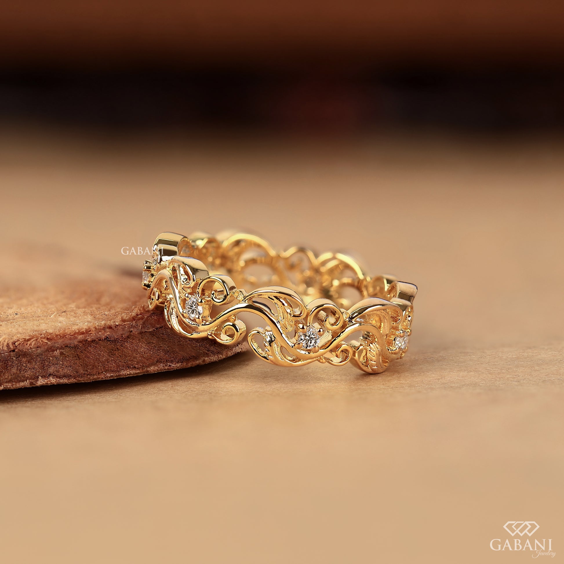 leaf and vine eternity wedding band with lab grown diamonds in 14k yellow gold