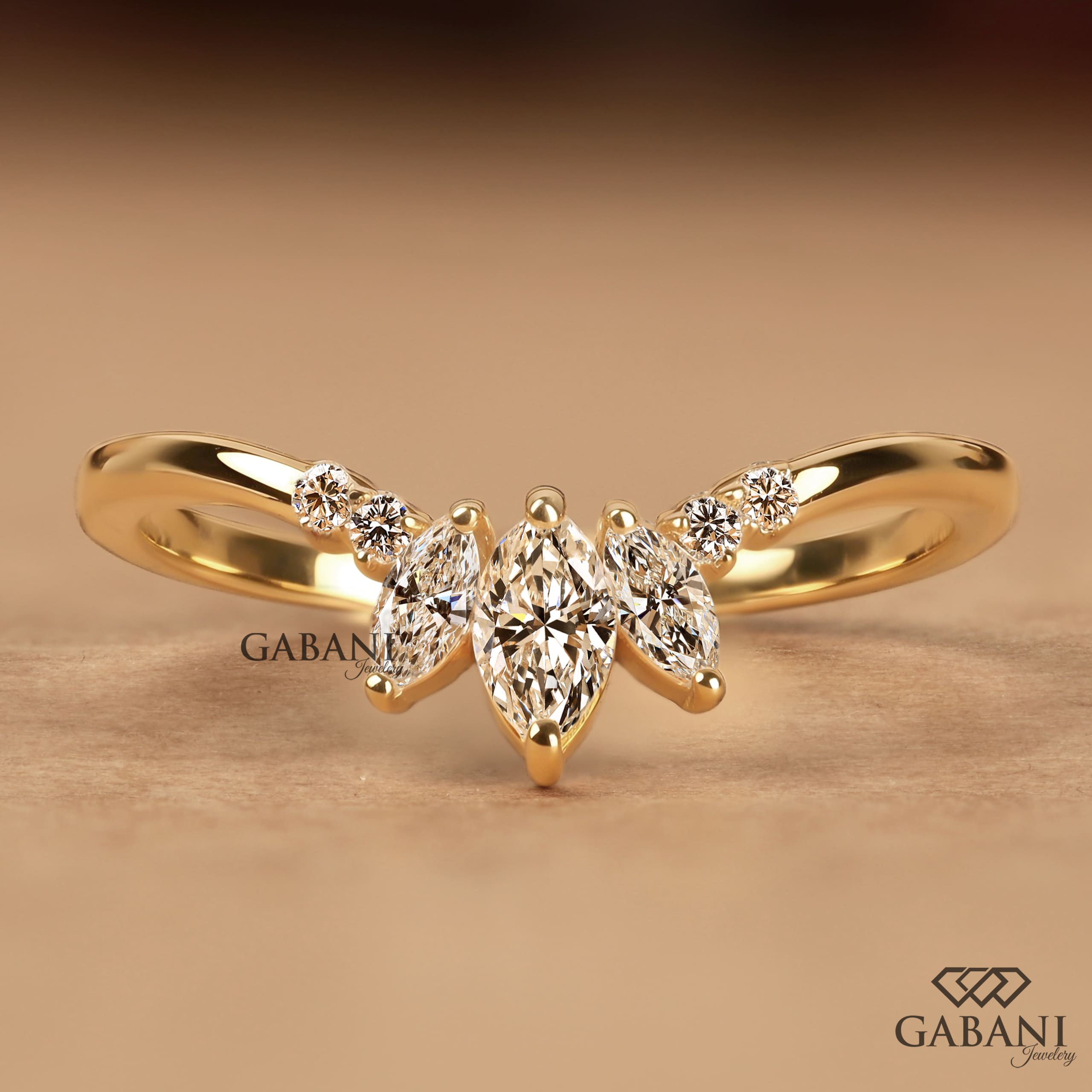 Marquise and round cut lab grown diamond curved wedding band in 14K yellow gold with a contour design, ideal for stacking with an engagement ring.