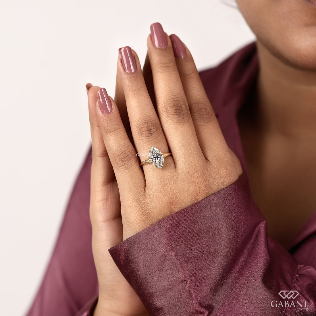 engagement ring with full bezel setting in yellow gold