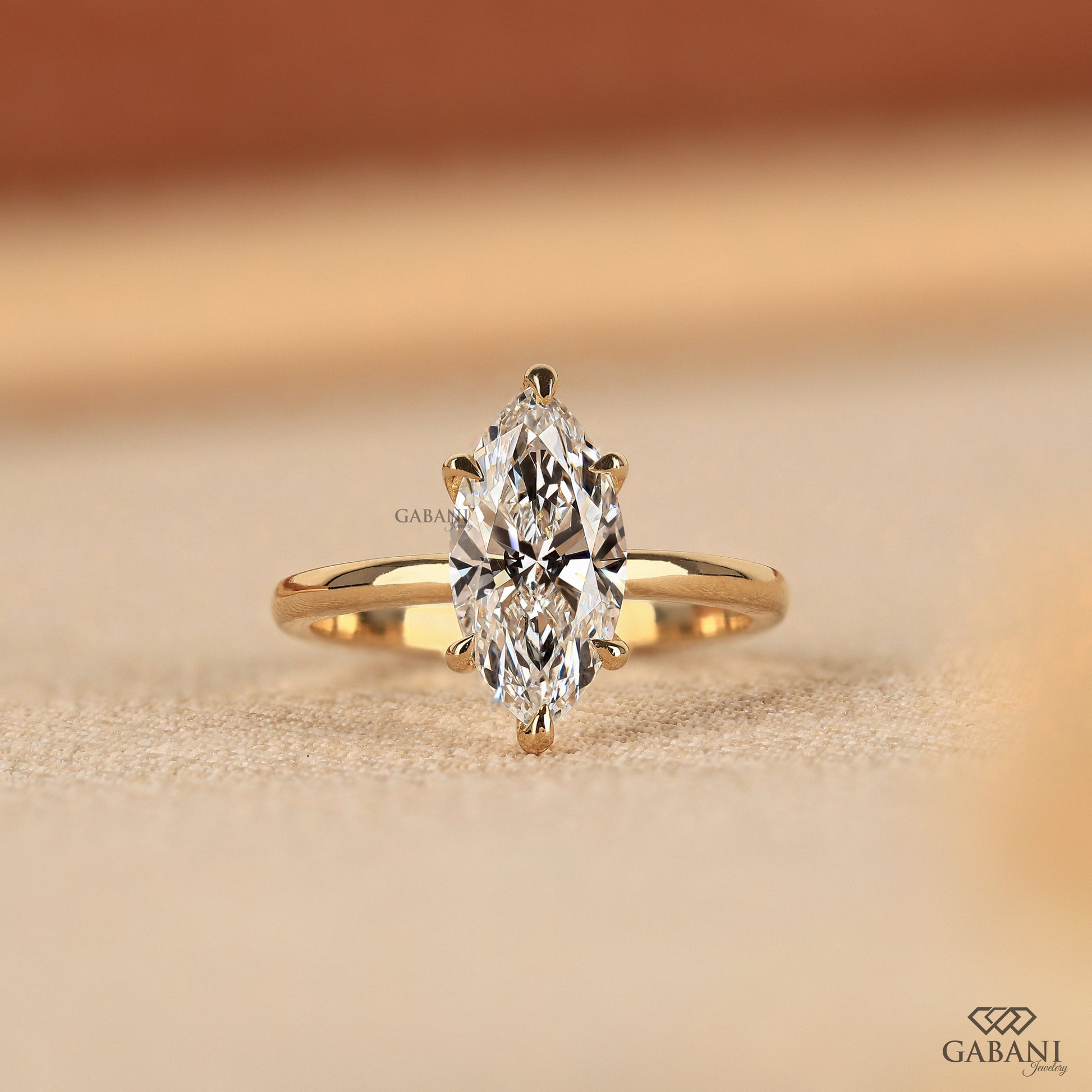 Gabani Jewelry marquise cut lab grown diamond solitaire ring in yellow gold
