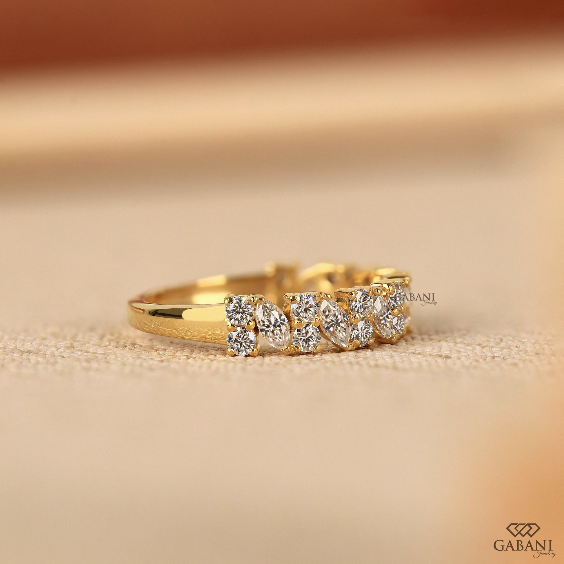 half eternity stacking band with marquise and round lab grown diamonds in smooth yellow gold