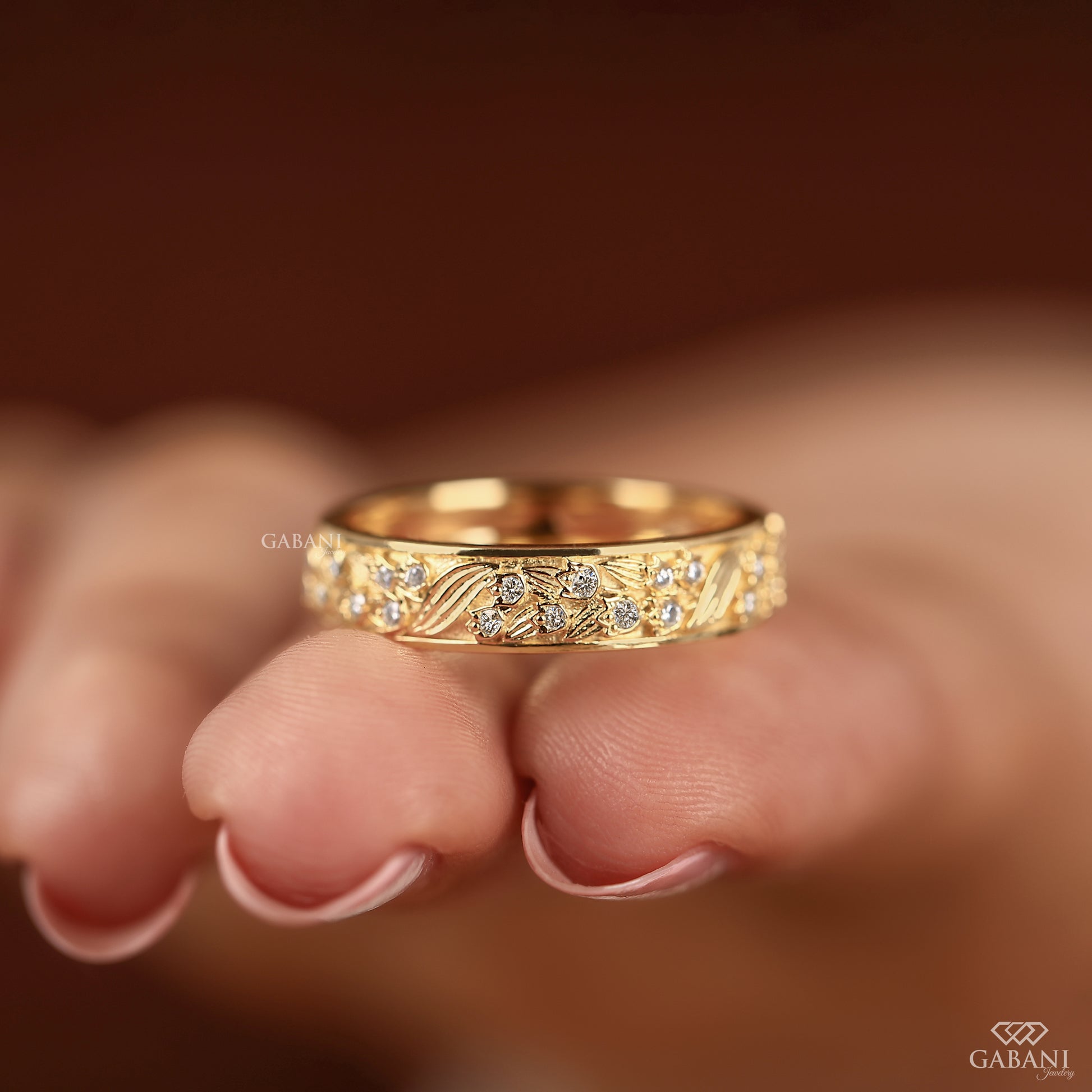 engraved leaf eternity band in yellow gold with slim comfort fit