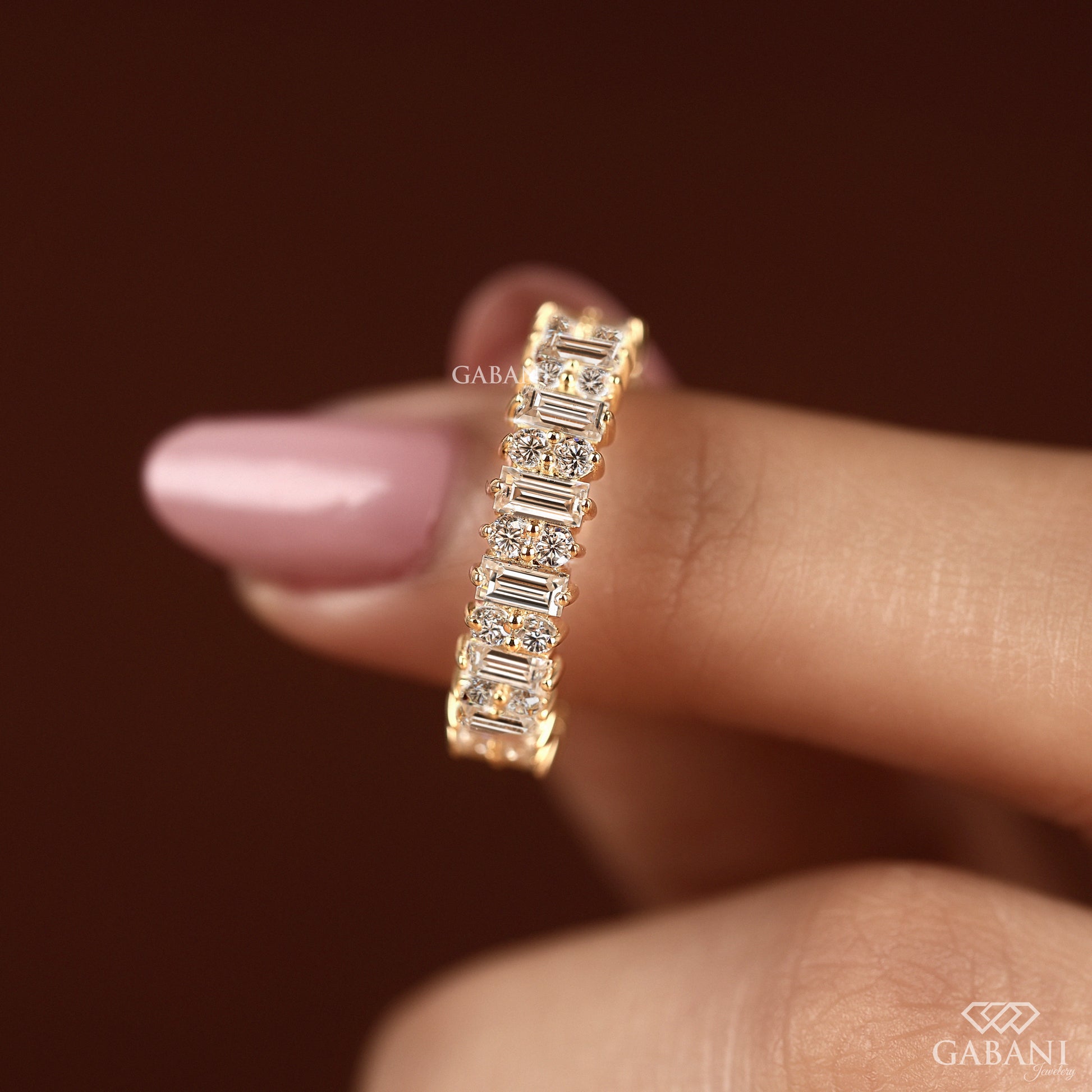 Lab grown diamond eternity band with baguette and round stones