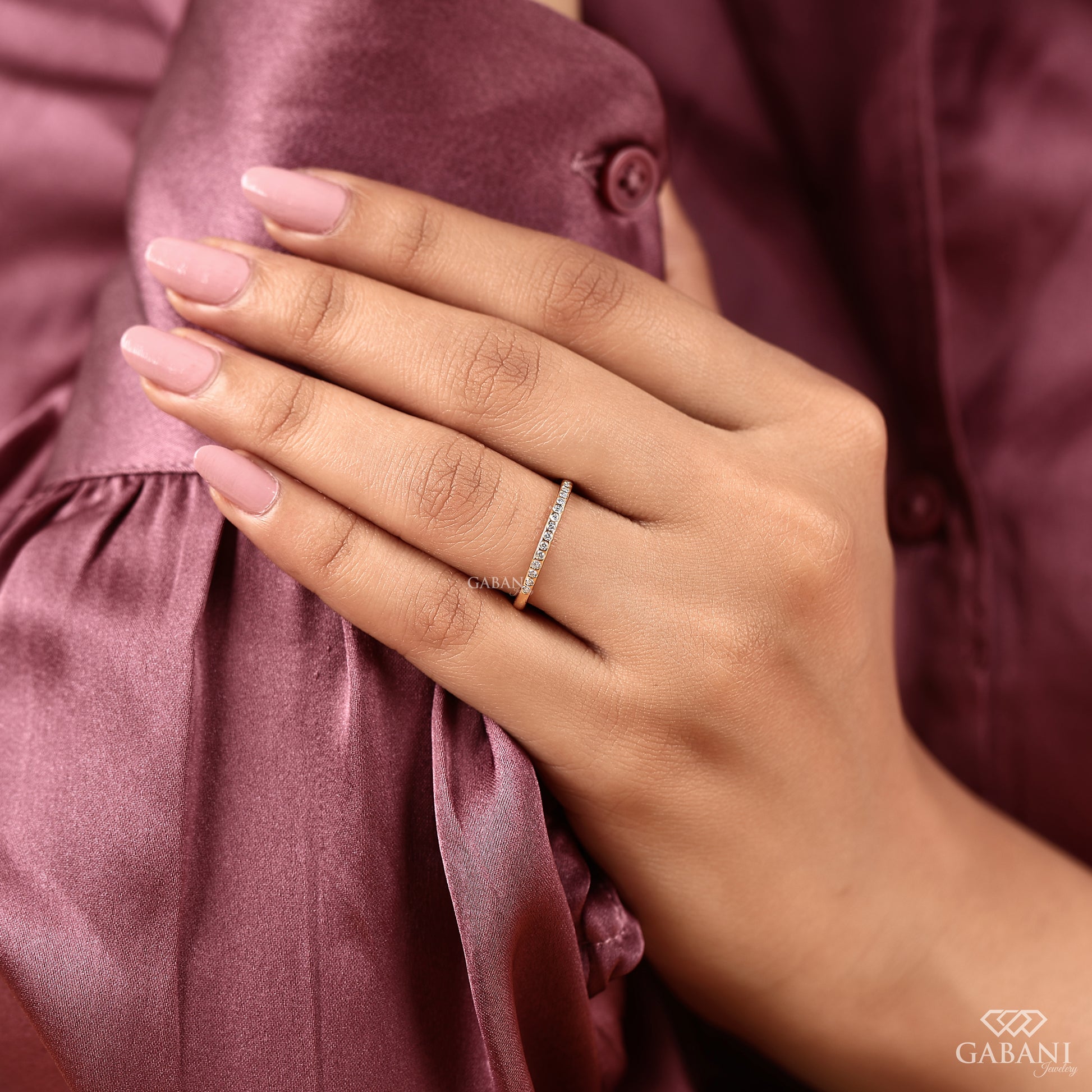 minimal flush set diamond band in 14k gold with seamless half eternity style