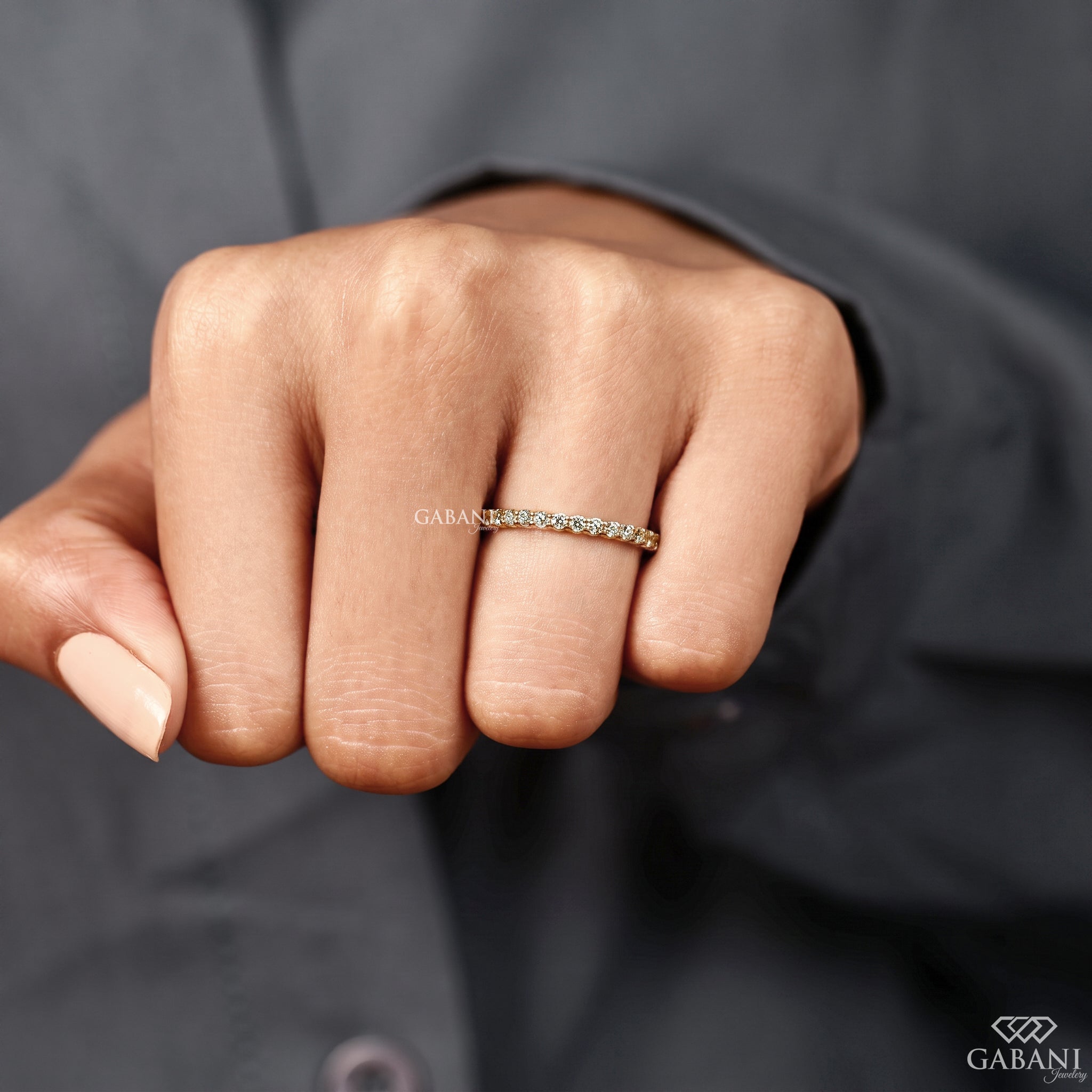 Minimal wedding ring with natural diamonds in a pave setting