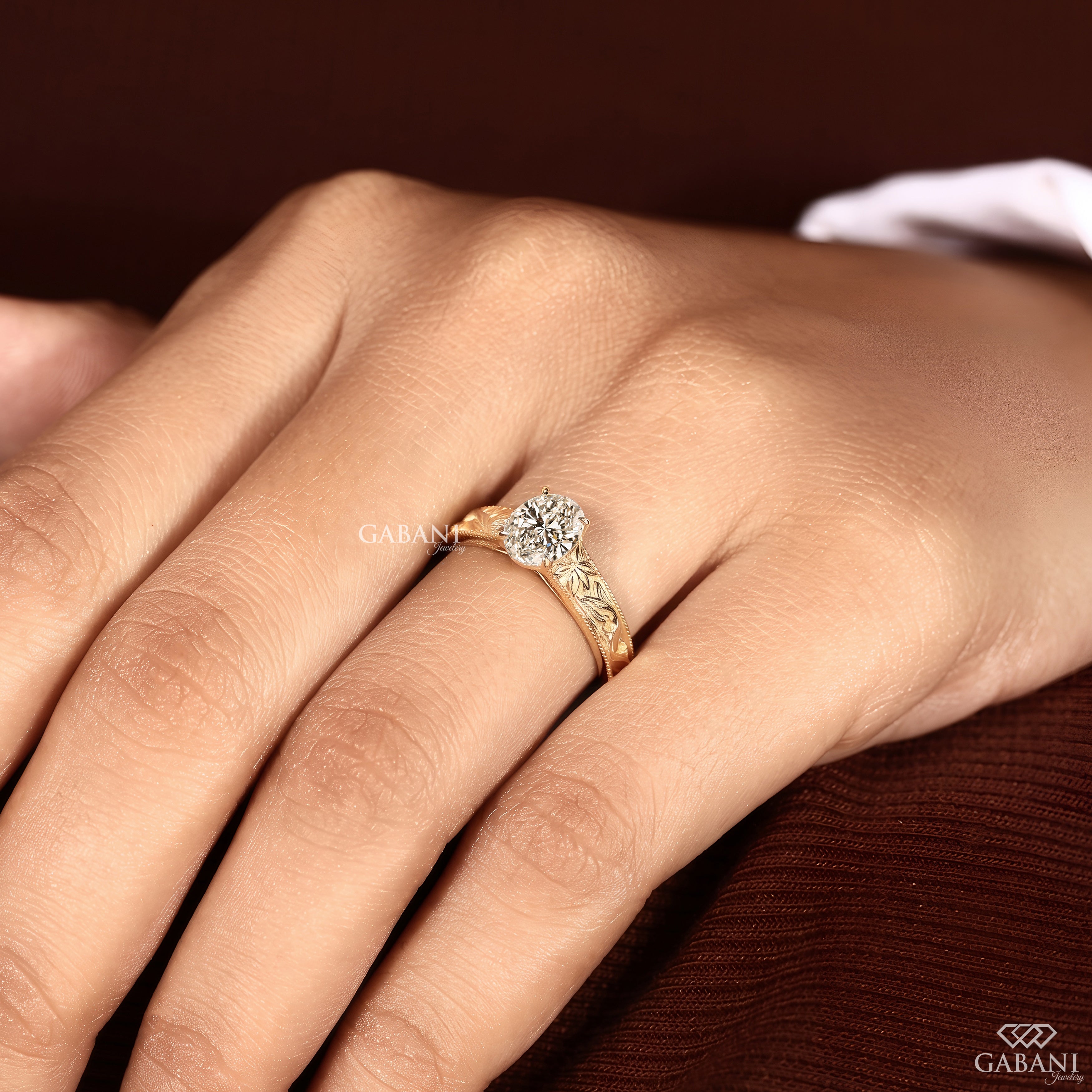 Nature inspired engagement ring featuring an oval lab grown diamond