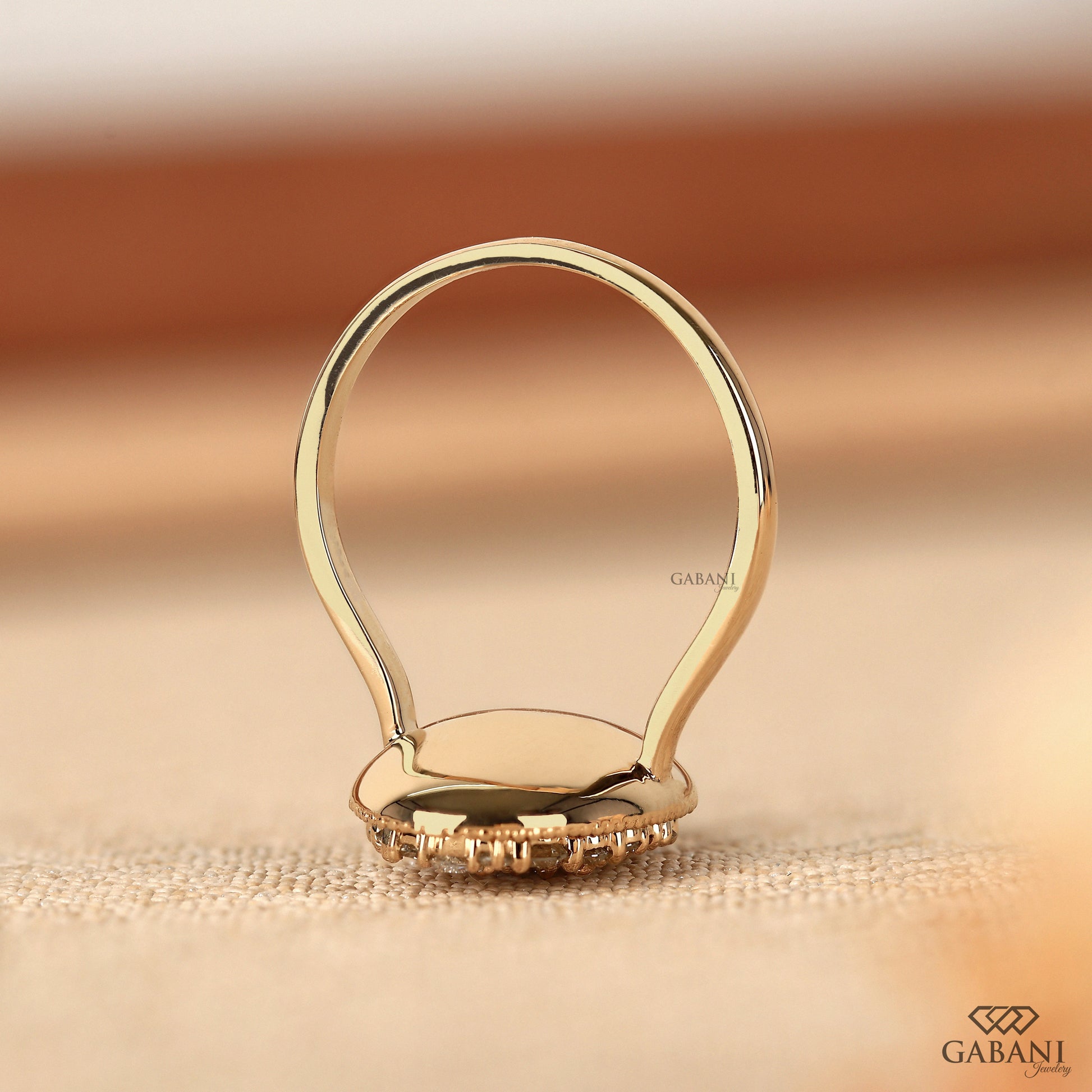 Art deco inspired oval mosaic diamond ring in solid gold
