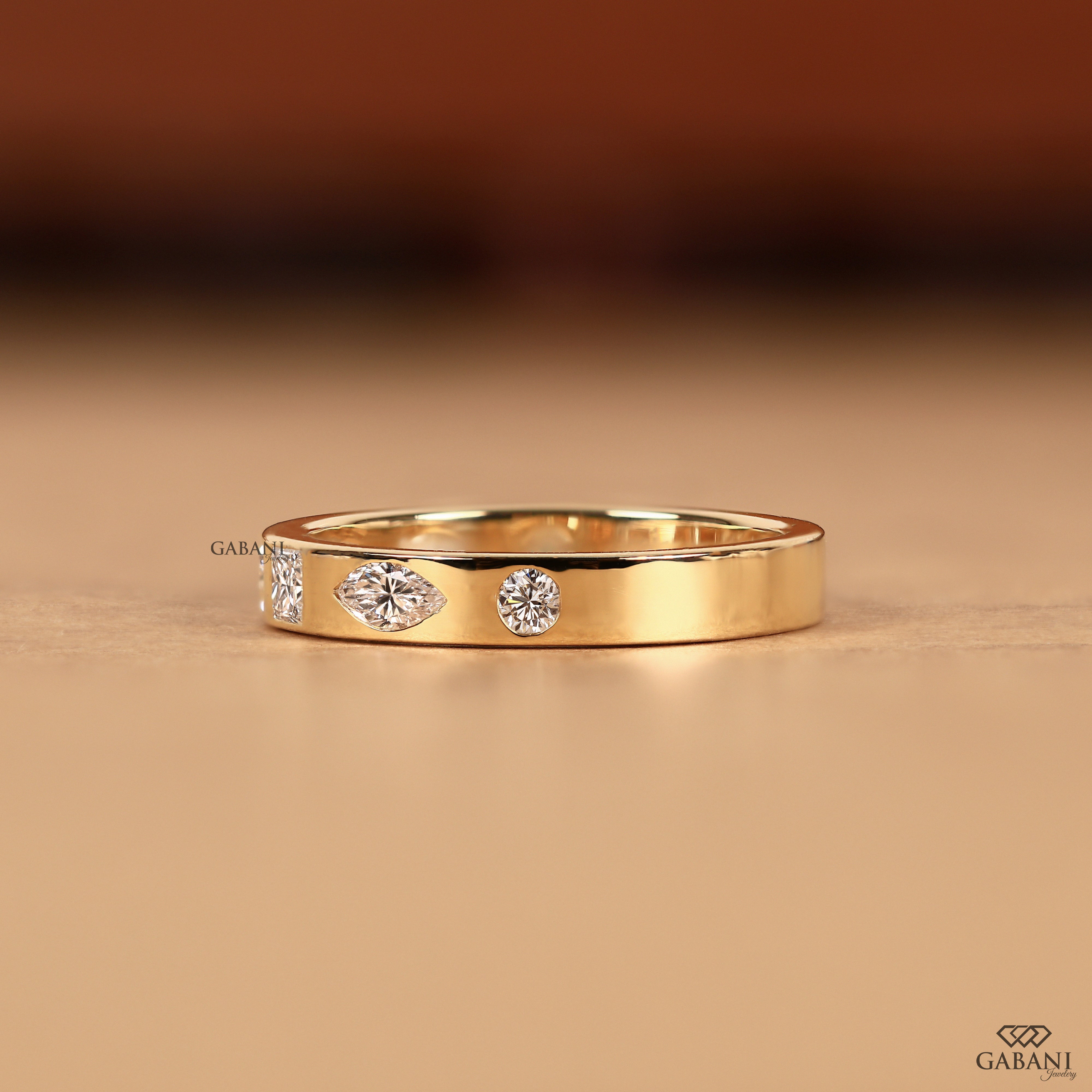 Flush set lab grown diamond band in solid 14K yellow gold featuring a flat comfort fit design that pairs naturally with engagement rings, bridal sets, and stackable bands.