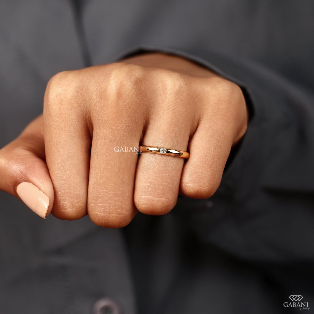 Single natural diamond wedding band with flush setting
