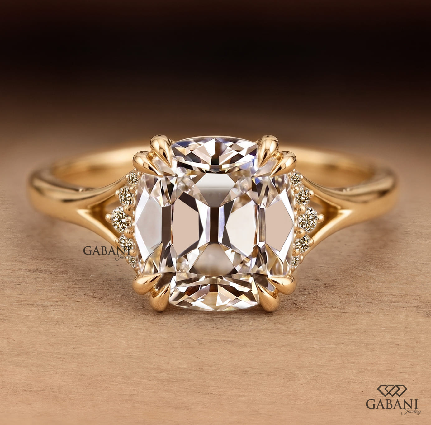 Old mine cushion cut lab grown diamond engagement ring with double claw prongs and split shank in 14K yellow gold