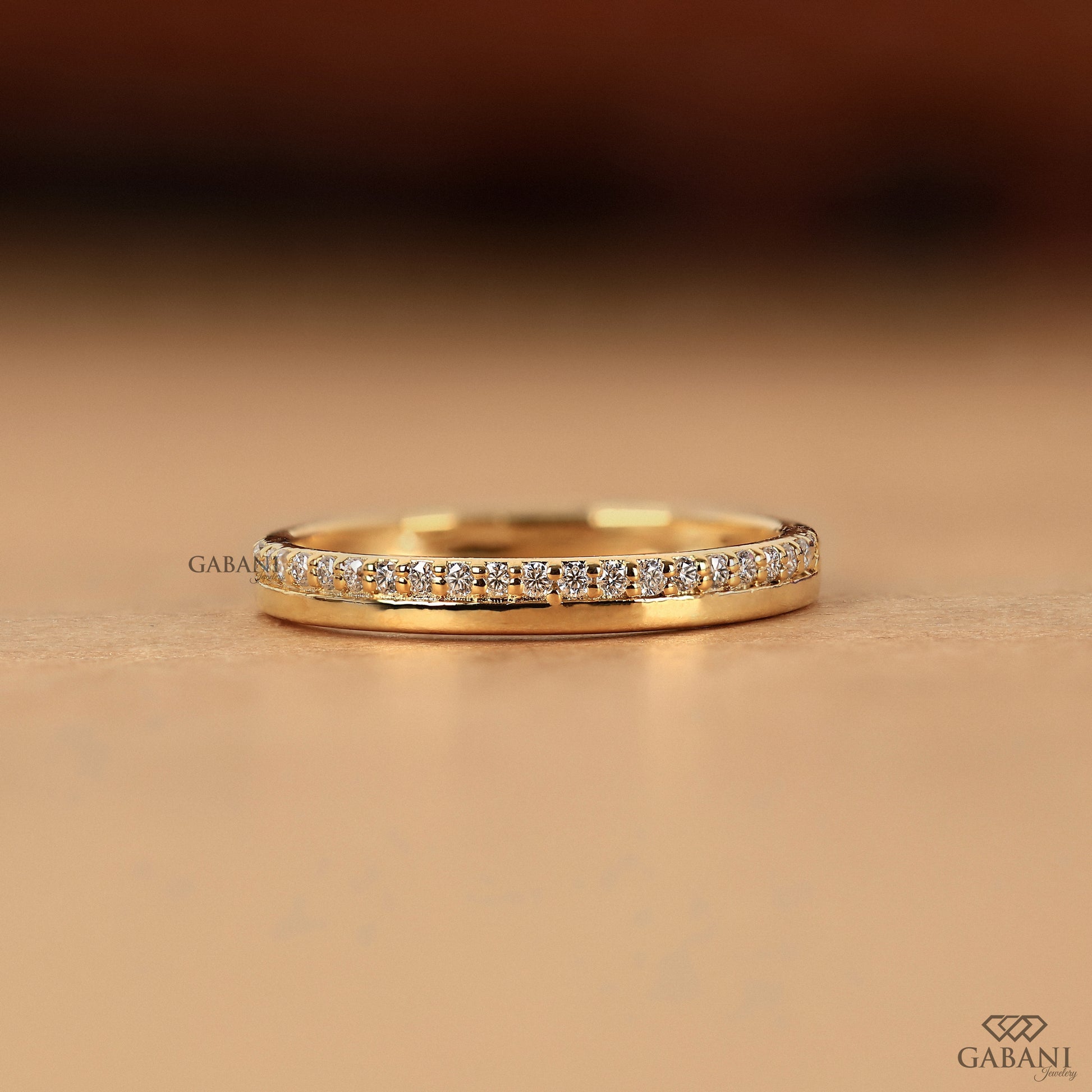 one side pave lab grown diamond band in gold half eternity ring