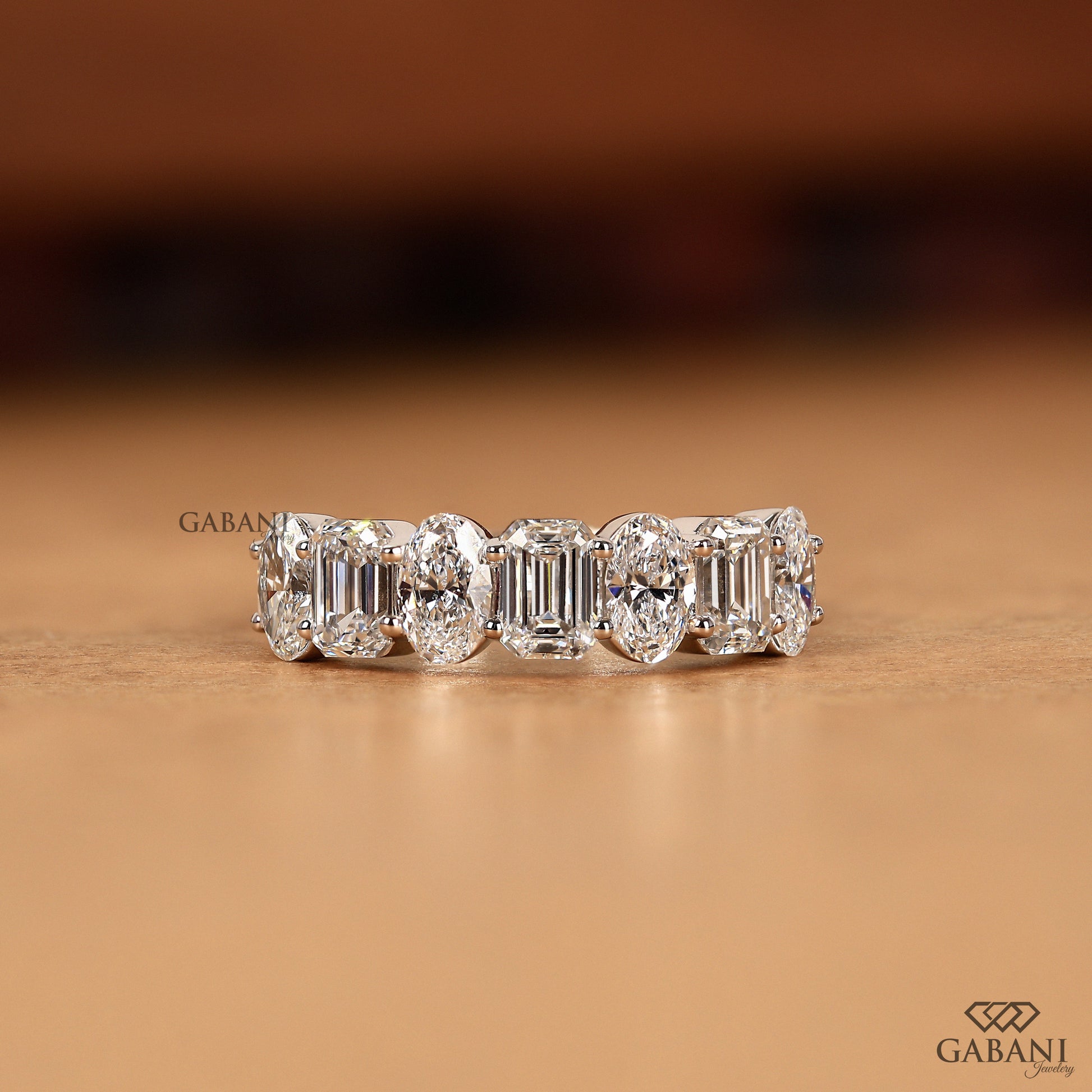 oval and emerald cut lab grown diamond half eternity wedding band in solid white gold