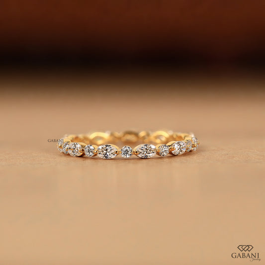 oval and round lab grown diamond eternity band in yellow gold
