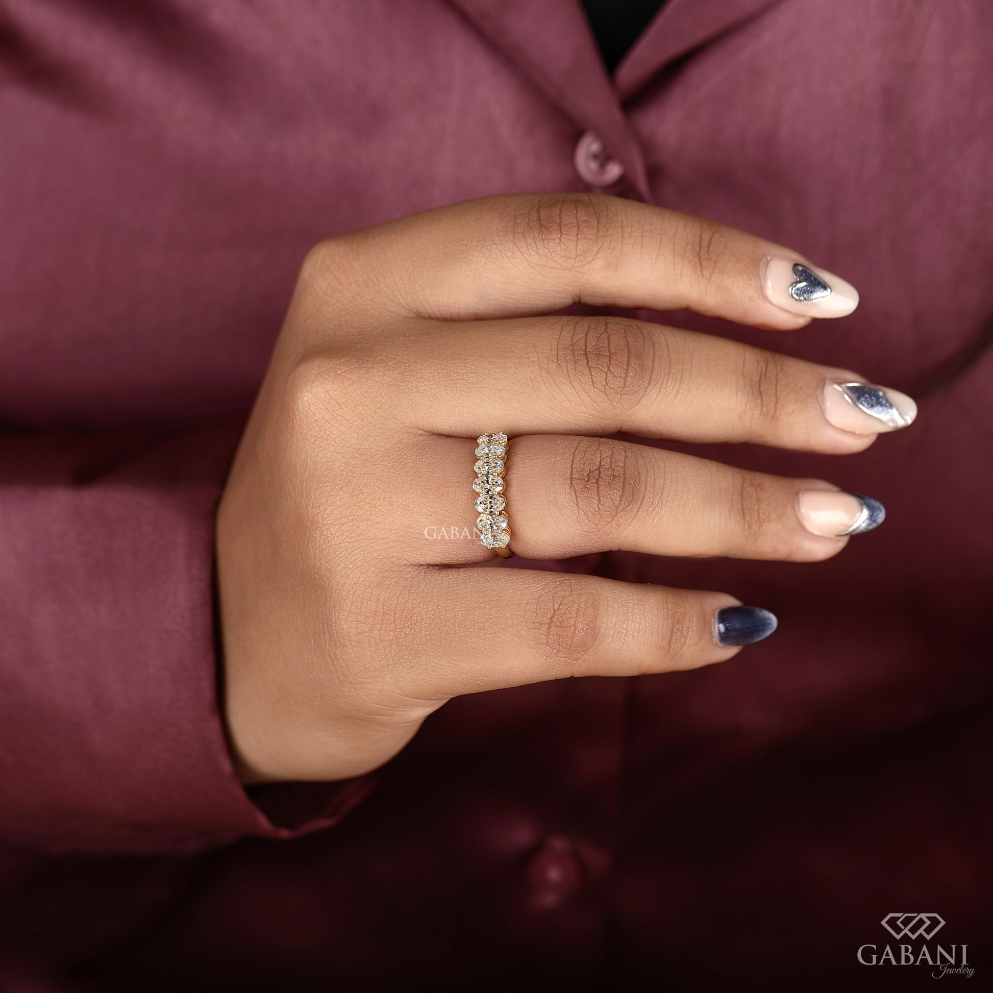 seven oval diamond half eternity band in yellow gold with smooth comfort fit profile
