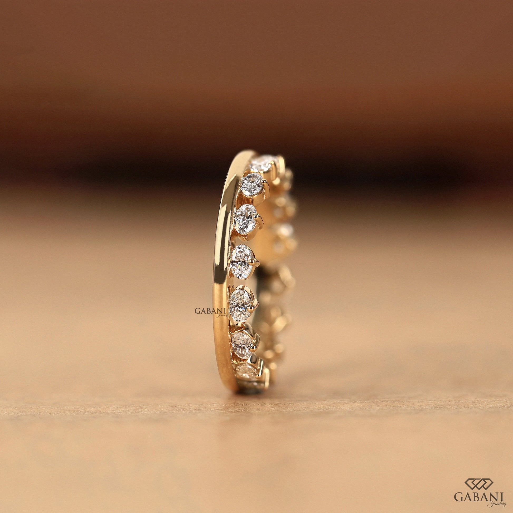 East west oval wedding band with lab diamonds