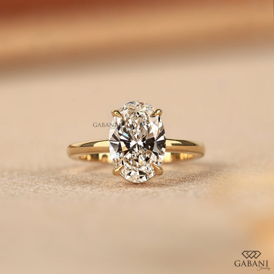 oval lab grown diamond solitaire ring in yellow gold

