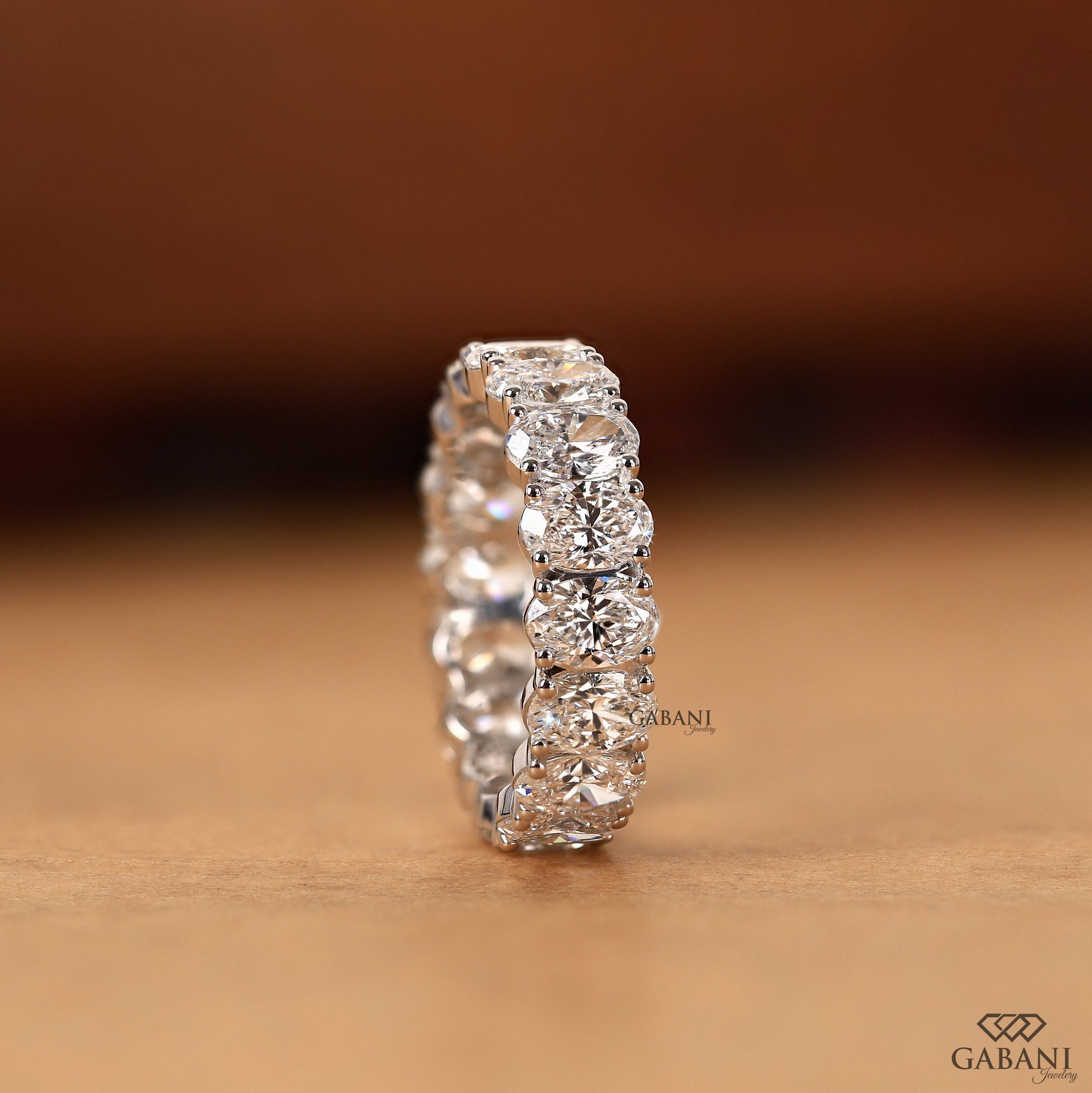 oval cut lab grown diamond eternity wedding band in white gold wide chunky band