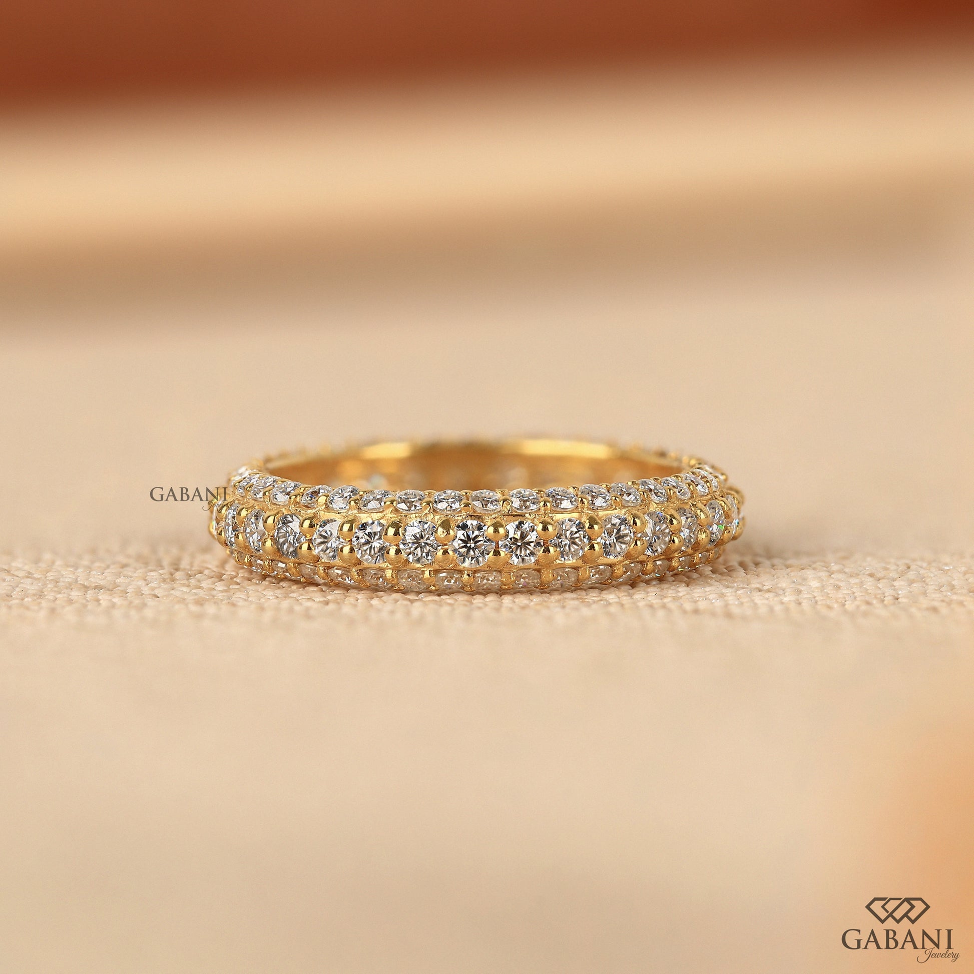 Three row diamond wedding band in a micro pave setting offering continuous sparkle and durability
