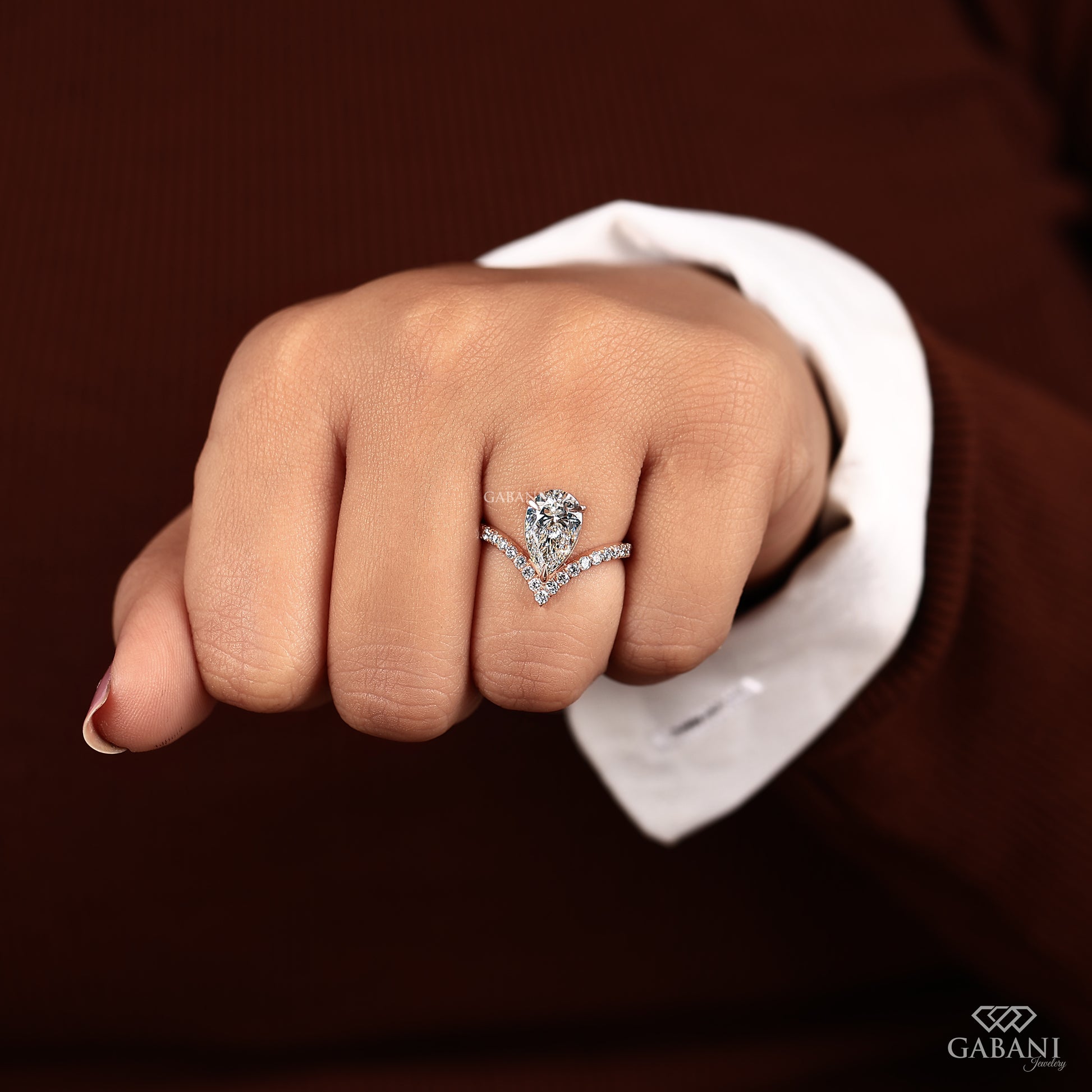 Modern V shaped ring with pear lab grown diamond in prong setting
