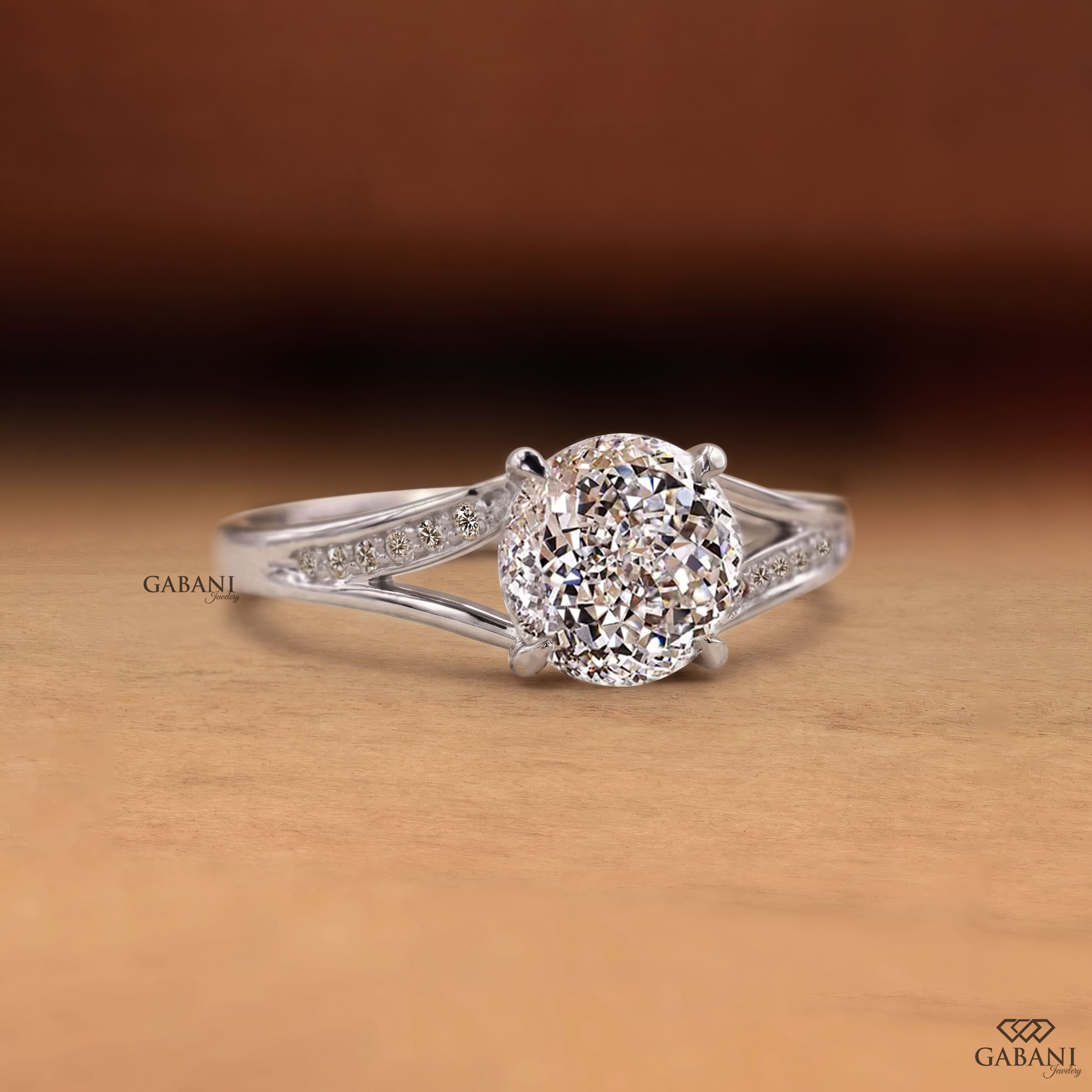 Round cut lab grown diamond engagement ring with split shank, pavé side stones, four-prong setting, and polished white gold band.