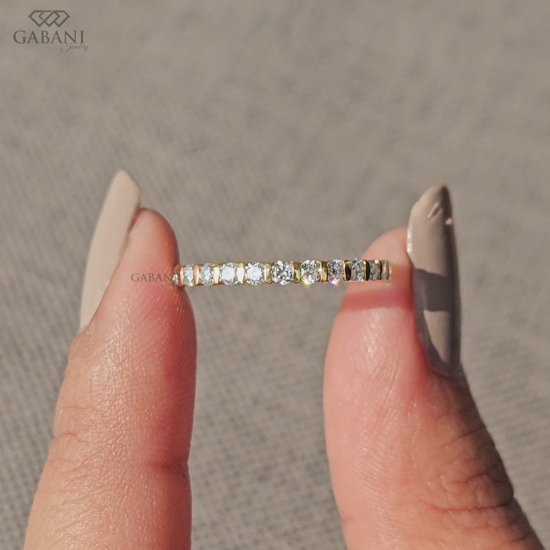round lab diamond eternity band with bar setting in solid gold