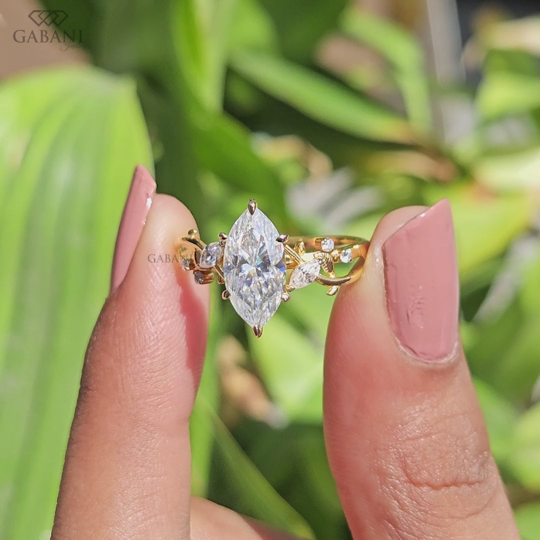 Nature inspired marquise lab grown diamond ring with leaf side accents