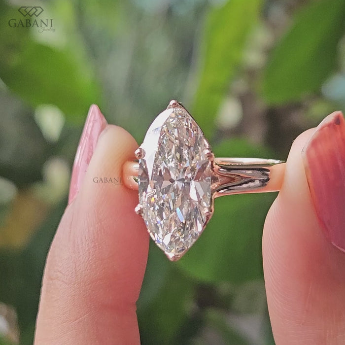 Vintage style marquise cut lab created diamond ring with hidden basket diamonds