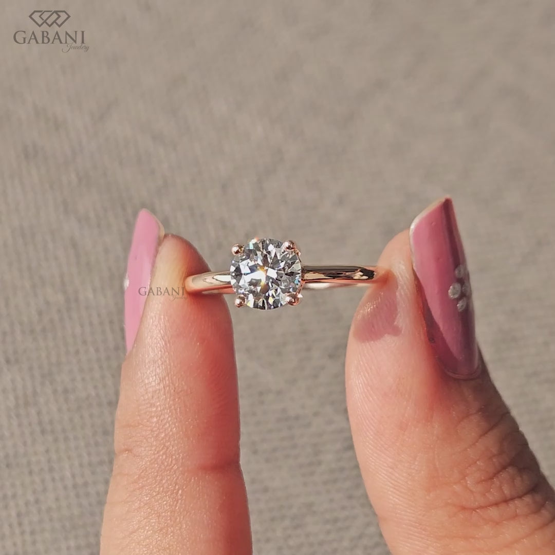 round cut lab grown diamond solitaire ring in 14k rose gold with slim band