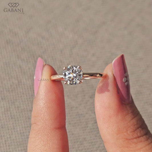 round cut lab grown diamond solitaire ring in 14k rose gold with slim band