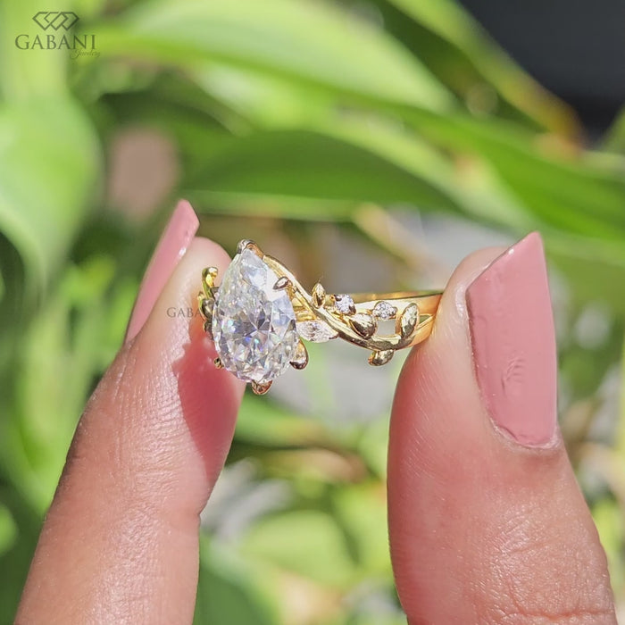 Video view of nature inspired pear cut lab grown diamond engagement ring in solid gold