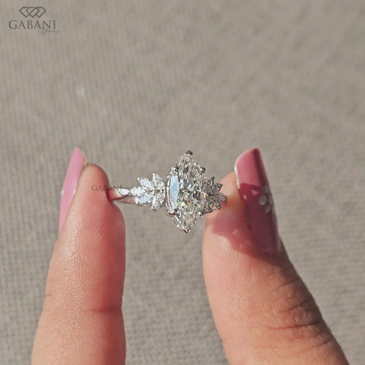 Marquise cut lab grown diamond engagement ring in white gold with elongated center stone and balanced side accents