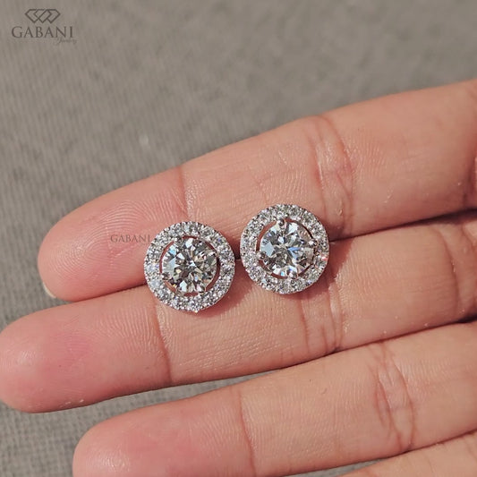 Round diamond halo studs with IGI certified lab grown stones
