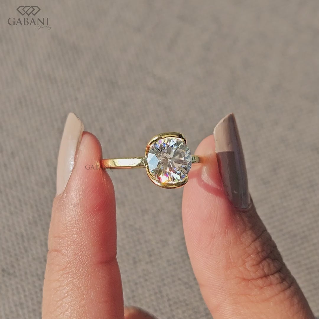 round cut lab grown diamond ring with half bezel setting in yellow gold
