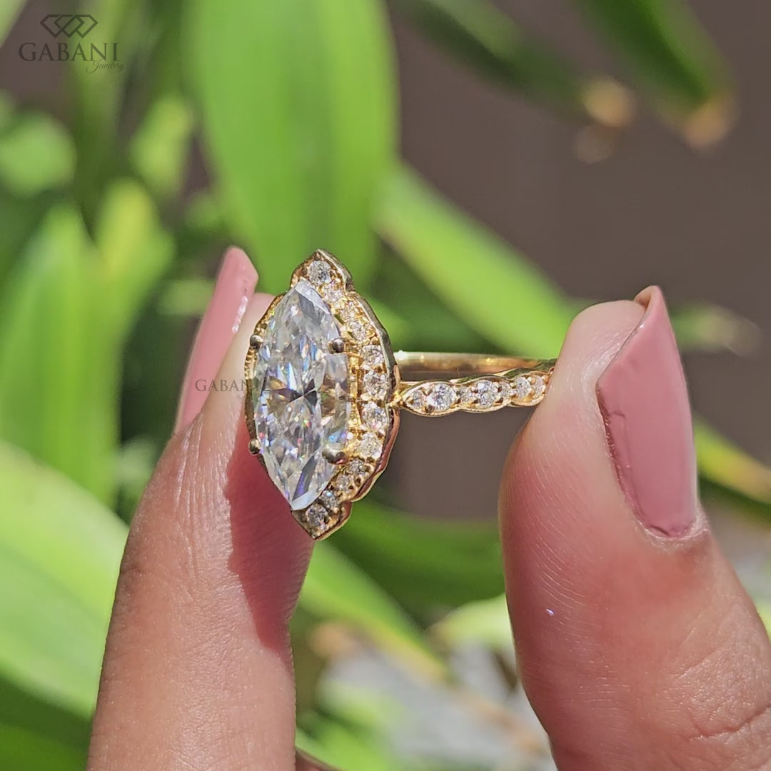 Marquise lab grown diamond engagement ring with halo and pave accents