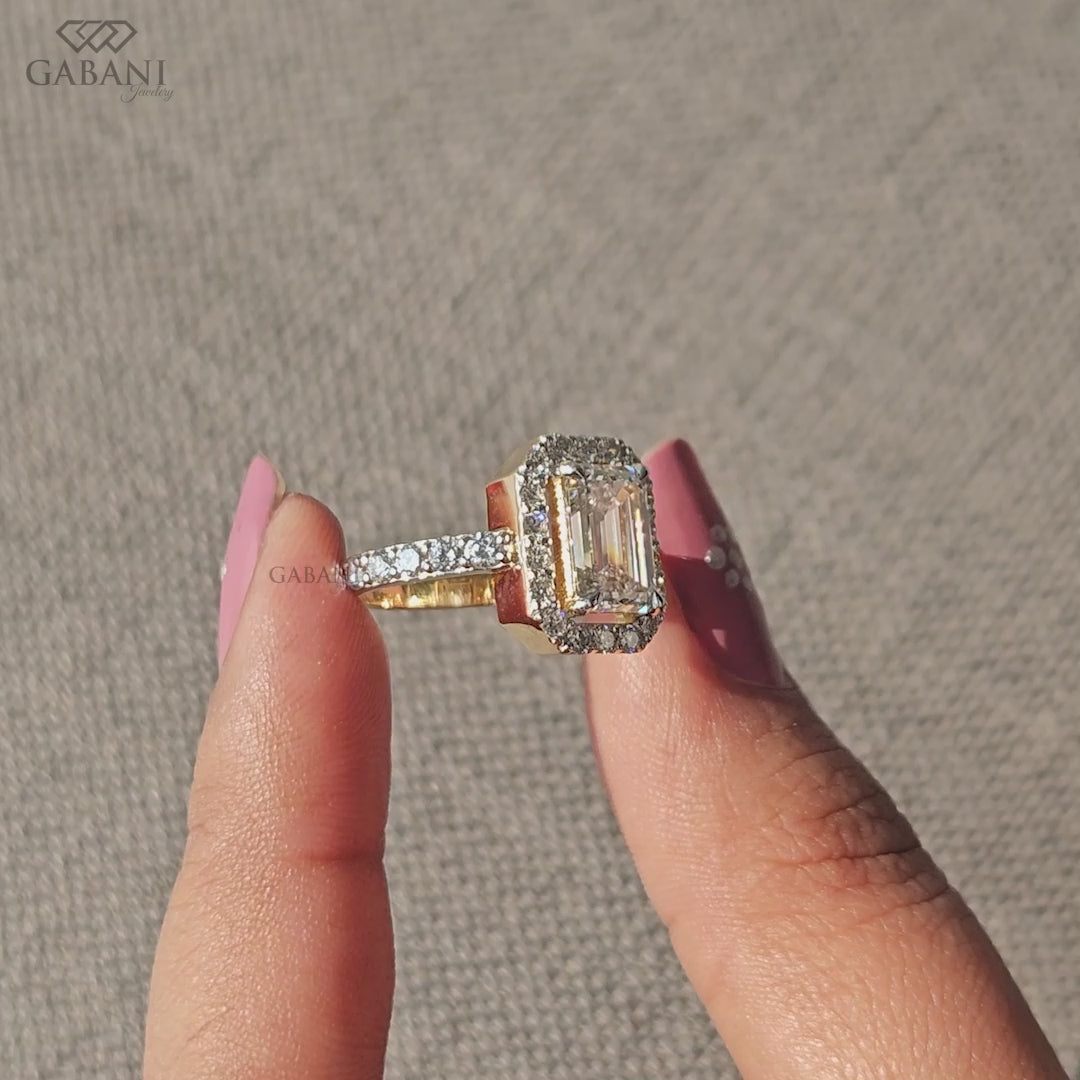 handmade emerald cut lab grown diamond ring with classic halo setting in yellow gold