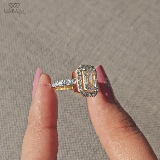 handmade emerald cut lab grown diamond ring with classic halo setting in yellow gold