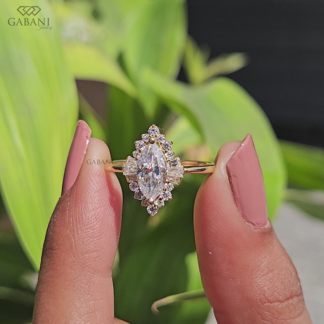 Marquise lab grown diamond engagement ring with floral halo, baguette side stones and yellow gold band, IGI certified EF color VS1 clarity