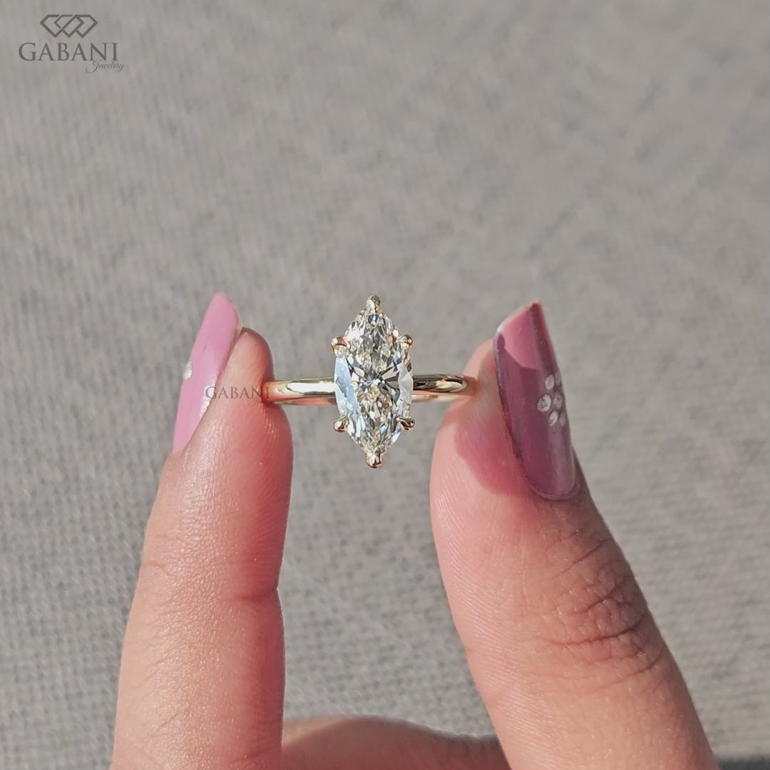 Marquise lab grown diamond solitaire ring in 14k yellow gold
