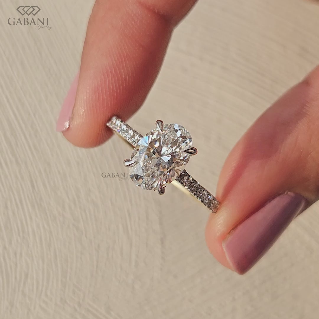 Oval lab grown diamond ring with hidden halo design