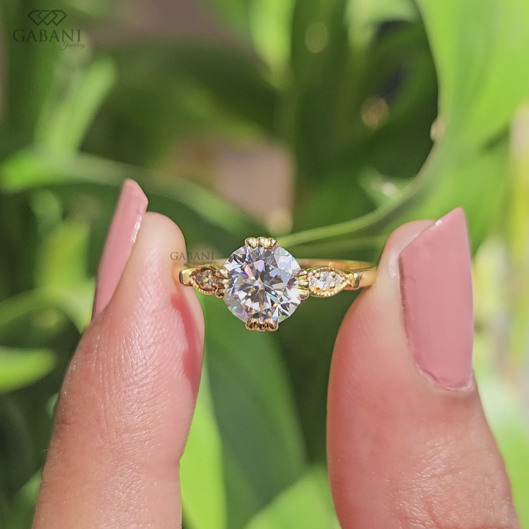 Round brilliant lab created diamond engagement ring worn on model hand