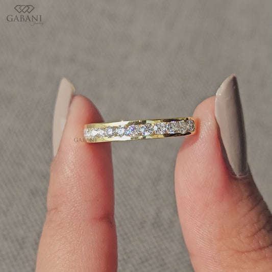 channel set wedding band with round lab grown diamonds in solid yellow gold