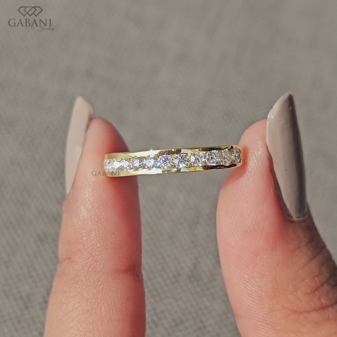 channel set wedding band with round lab grown diamonds in solid yellow gold