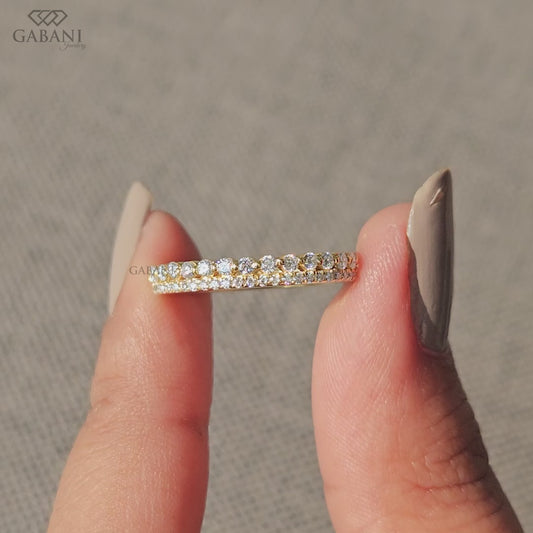 lab grown diamond wedding band featuring a slim double row design in yellow gold with clean pave and single prong setting