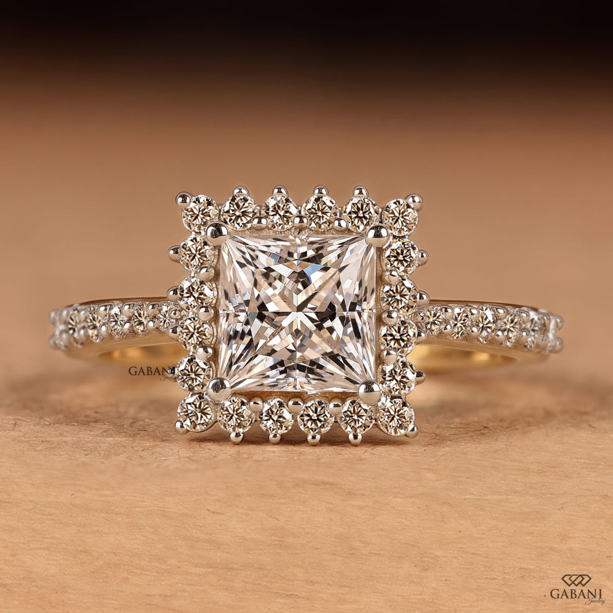 Princess cut lab grown diamond engagement ring in yellow gold featuring a round diamond halo and pave diamond band, designed as a bridal, proposal, anniversary, or engagement ring.