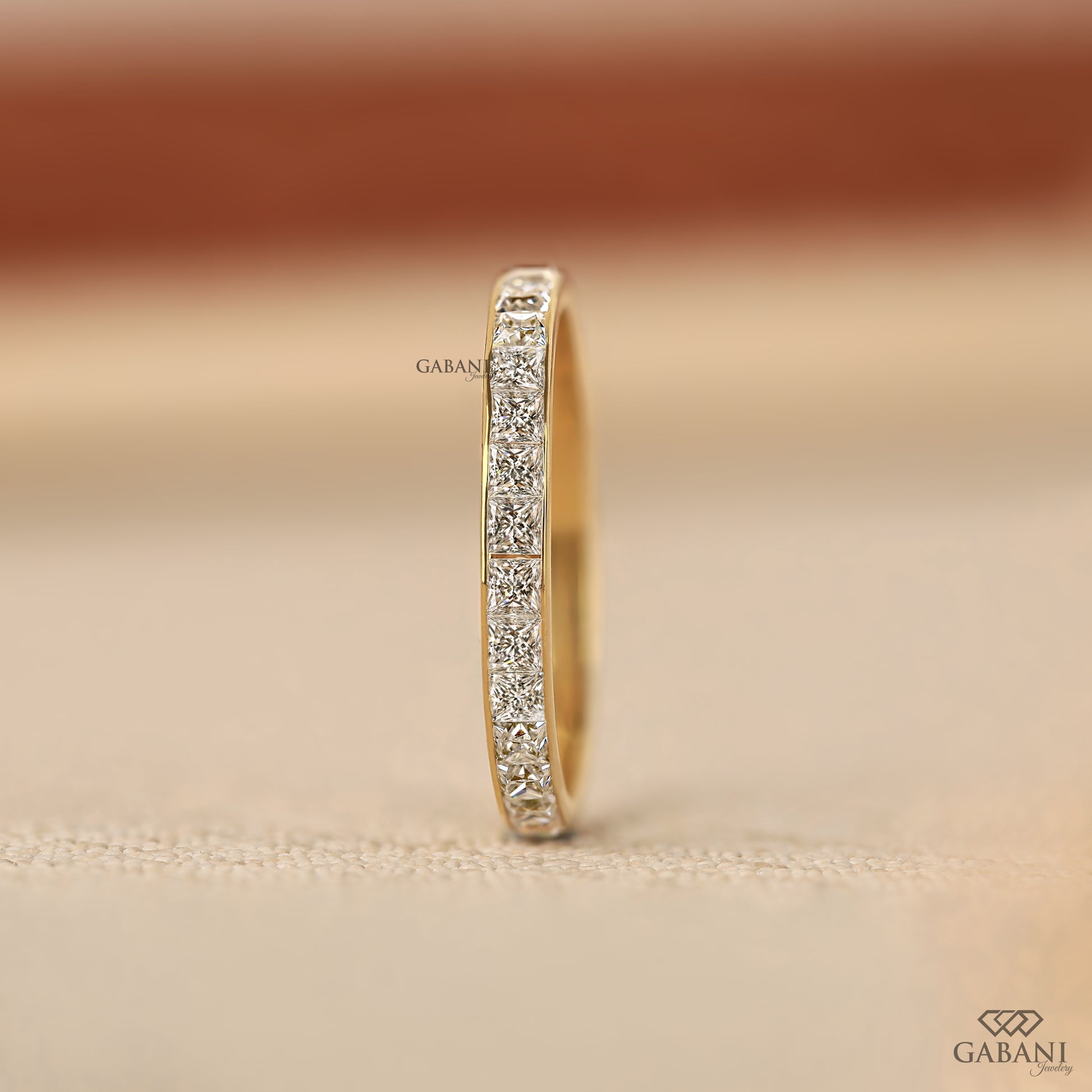 princess cut lab grown diamond half eternity band with sleek yellow gold comfort fit