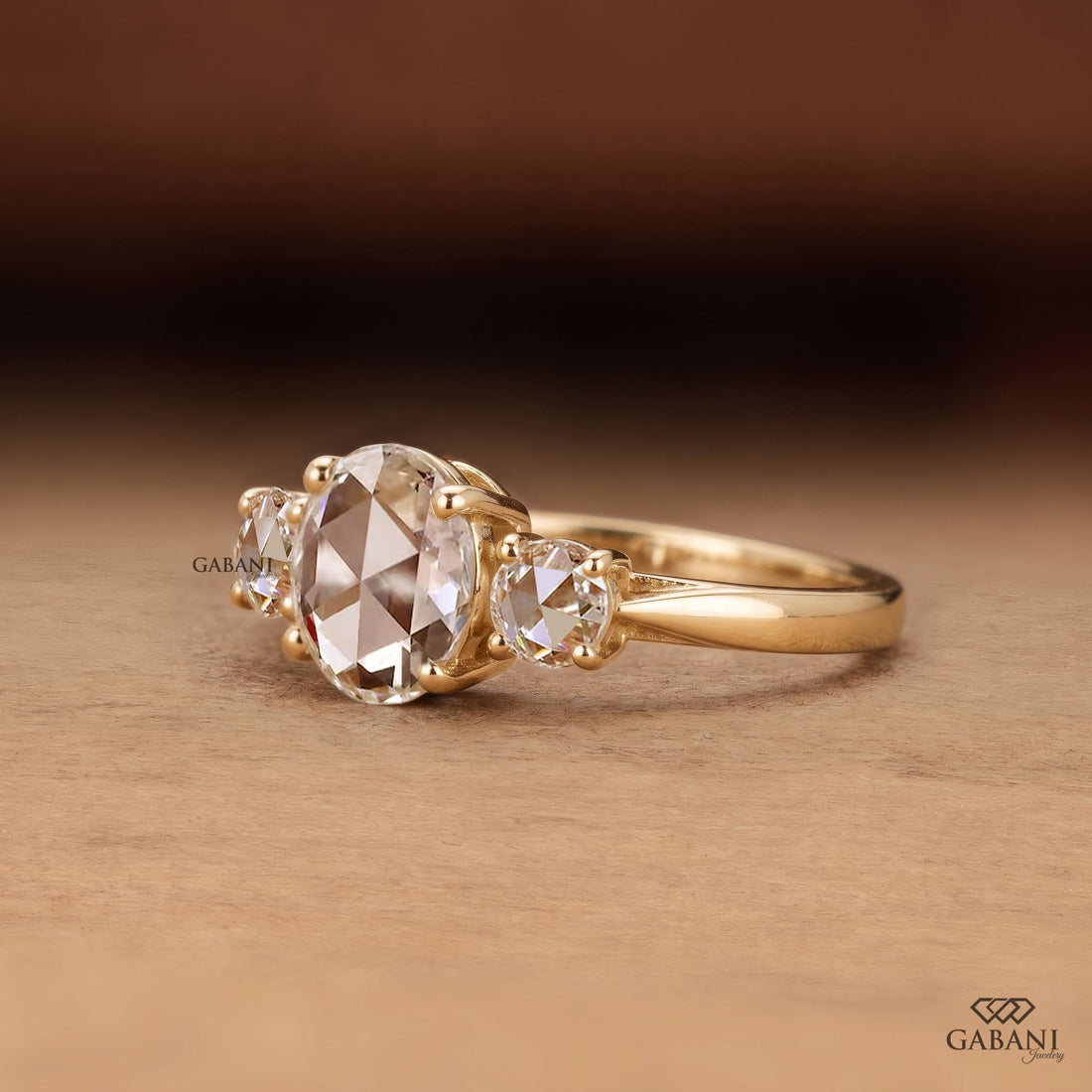 Round rose cut lab grown diamond three stone engagement ring with matching side diamonds, classic prong setting and vintage inspired design.