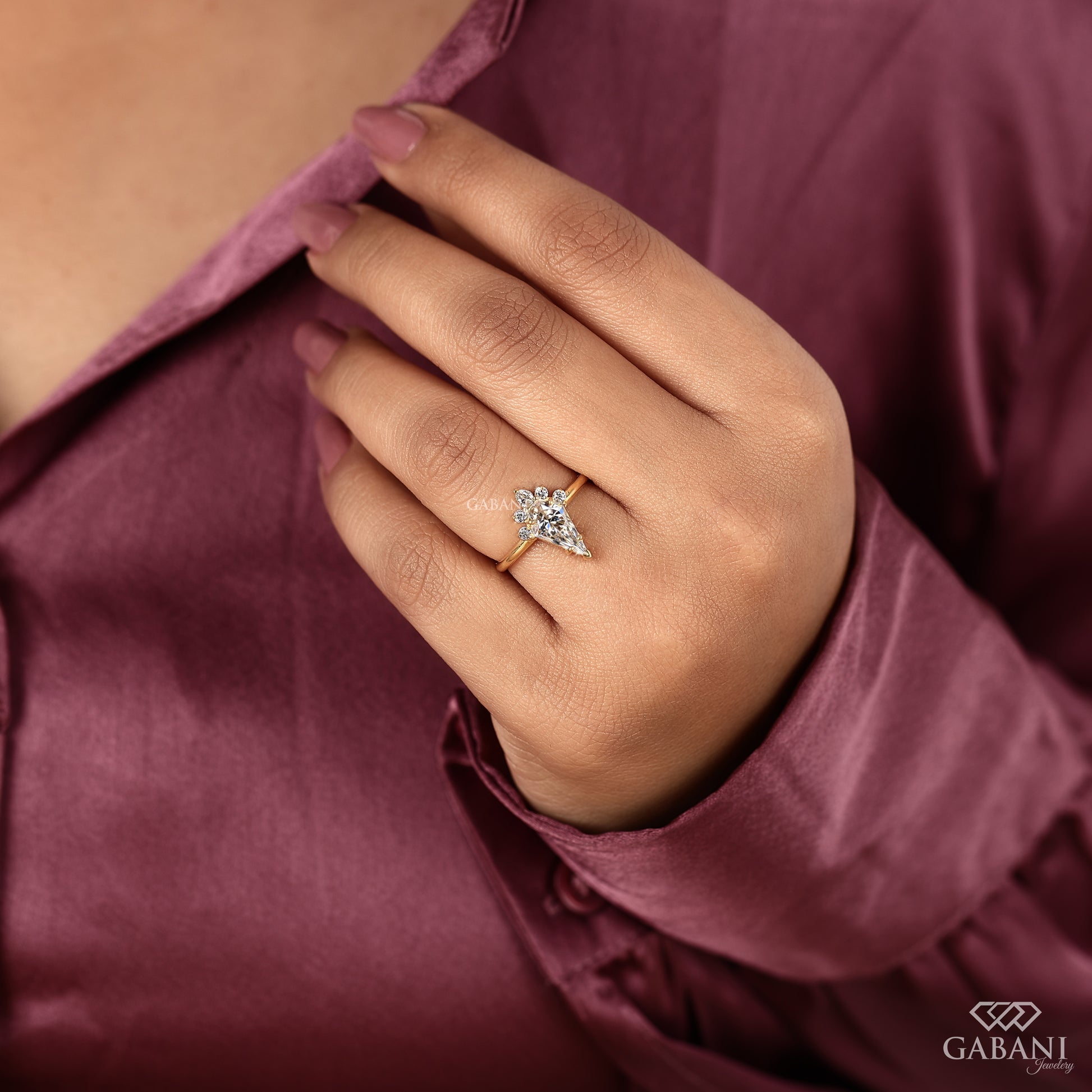 vintage style yellow gold ring featuring kite cut lab grown diamond and accent diamonds
