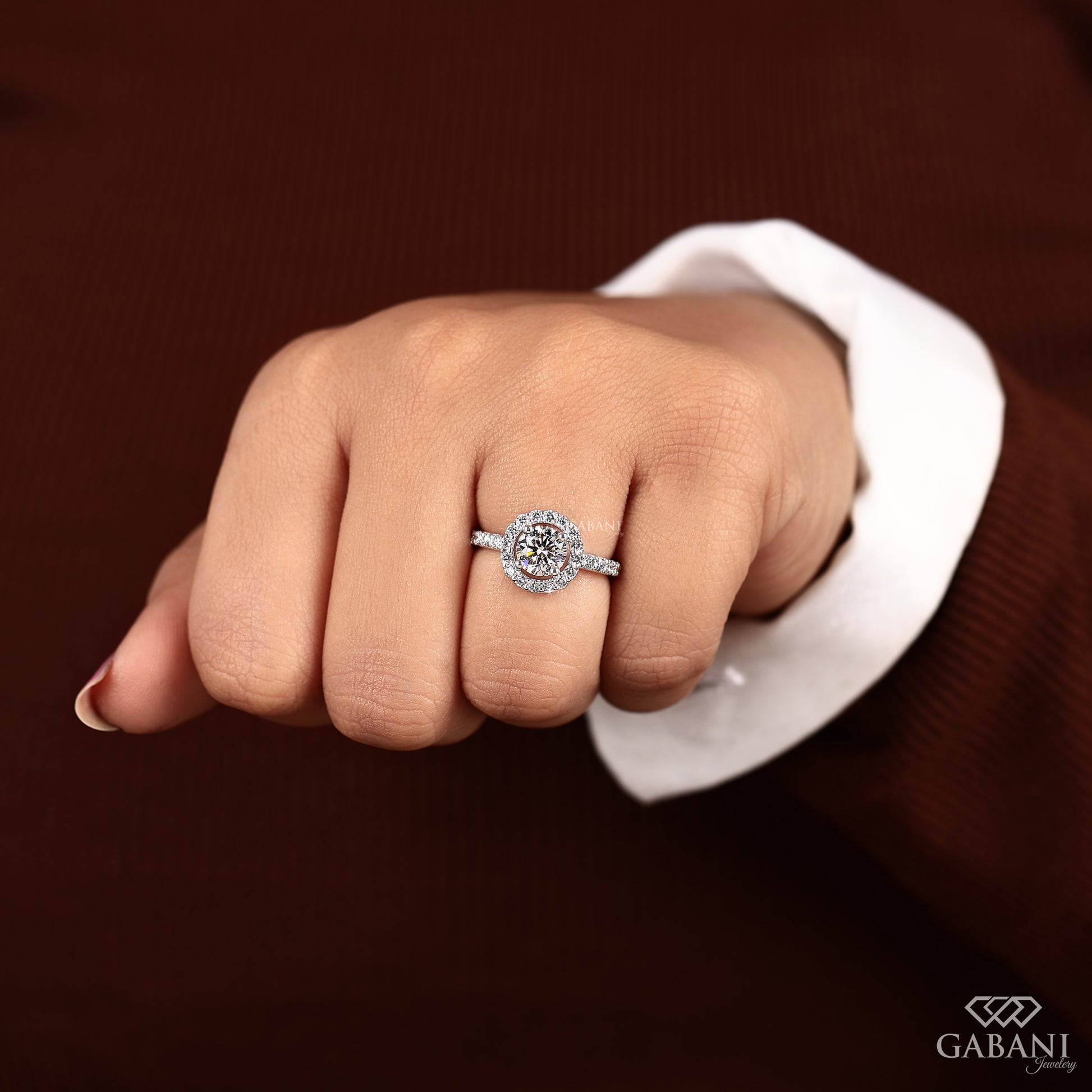 white gold engagement ring with round lab created diamond and halo